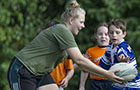 Rugby trainer and children (Photo: Anspach) Rugby trainer and children (Photo: Anspach)